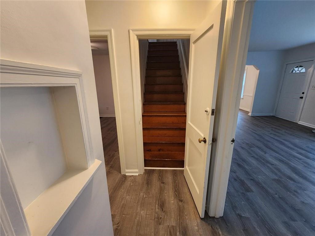 2431 North Decatur Road Decatur, GA 30033 - Photo 21 of 34 a view of a hallway with wooden floor and stairs