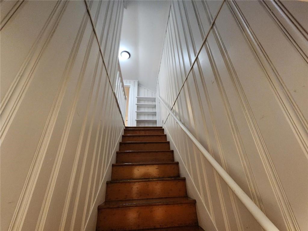 2431 North Decatur Road Decatur, GA 30033 - Photo 22 of 34 a view of staircase with wooden floor and white walls