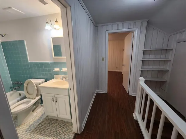 a bathroom with a sink and a toilet