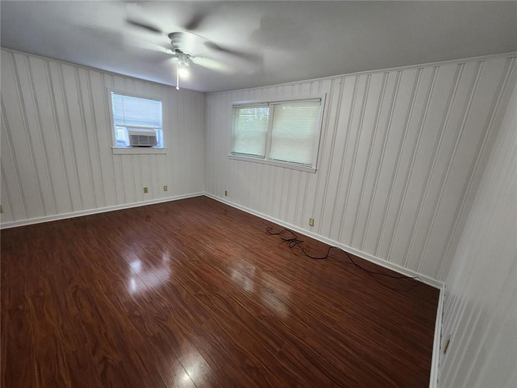 2431 North Decatur Road Decatur, GA 30033 - Photo 31 of 34 wooden floor in an empty room with a window