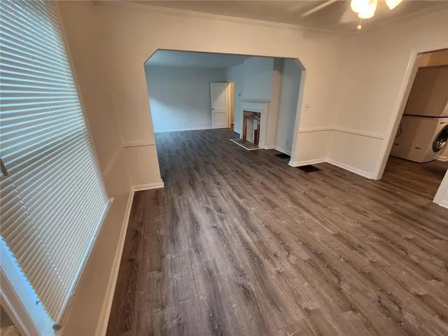 a view of a livingroom with wooden floor