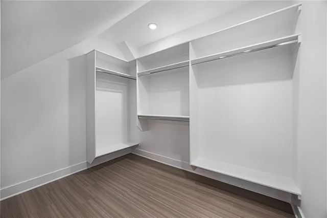 a view of an empty walk in closet