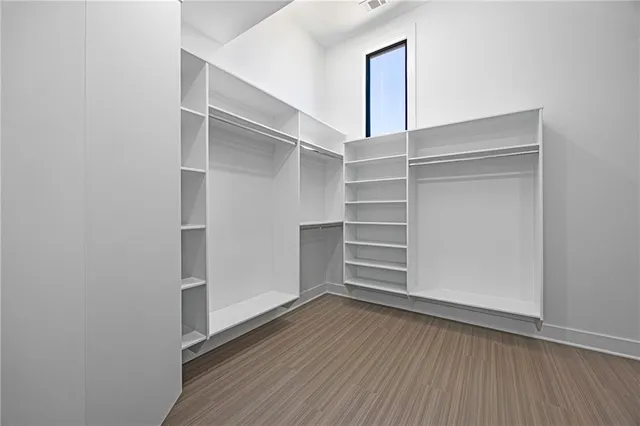 a view of an empty walk in closet