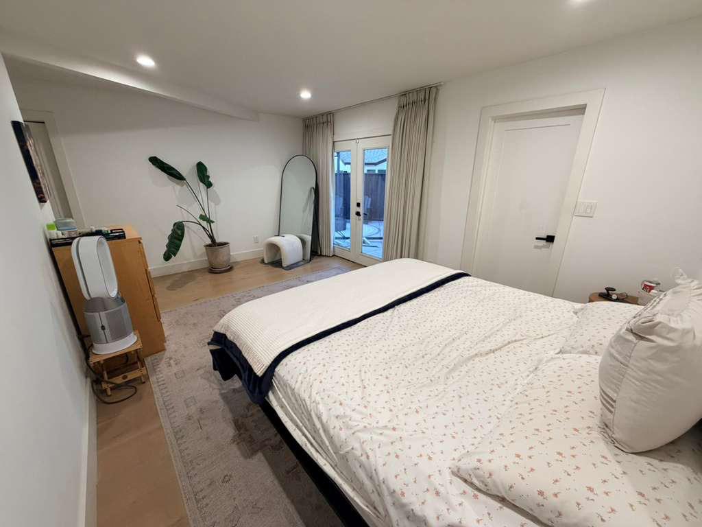 1215 North Bascom Avenue San Jose, CA 95128 - Photo 13 of 15 a bedroom with bed and window