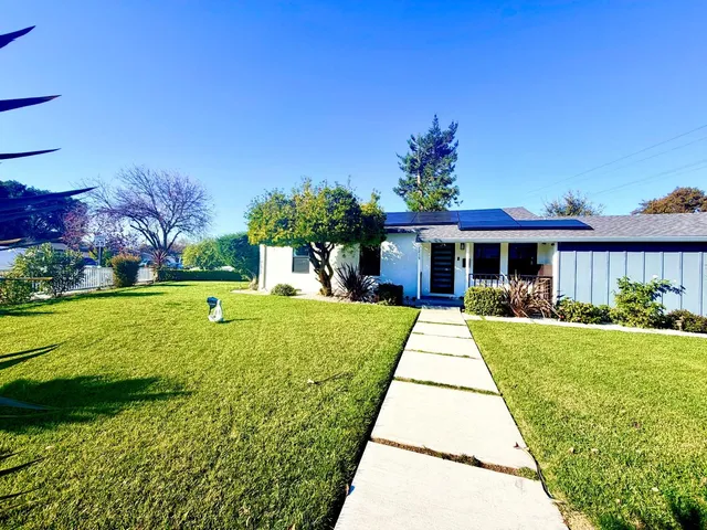 a view of a house with garden