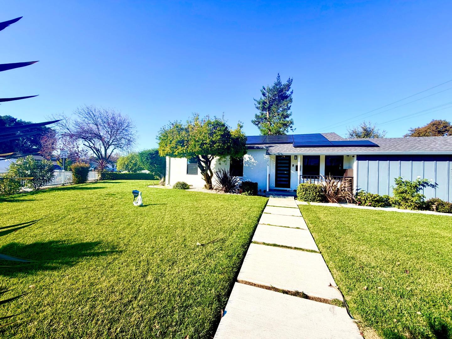 1215 North Bascom Avenue San Jose, CA 95128 - Photo 2 of 15 a view of a house with garden