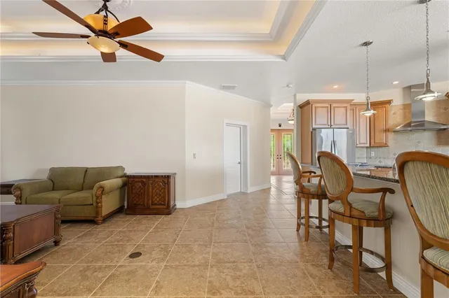 a spacious bedroom with a bed and a window