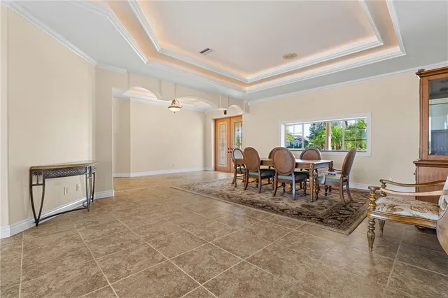 an aerial view of a house with a lake view