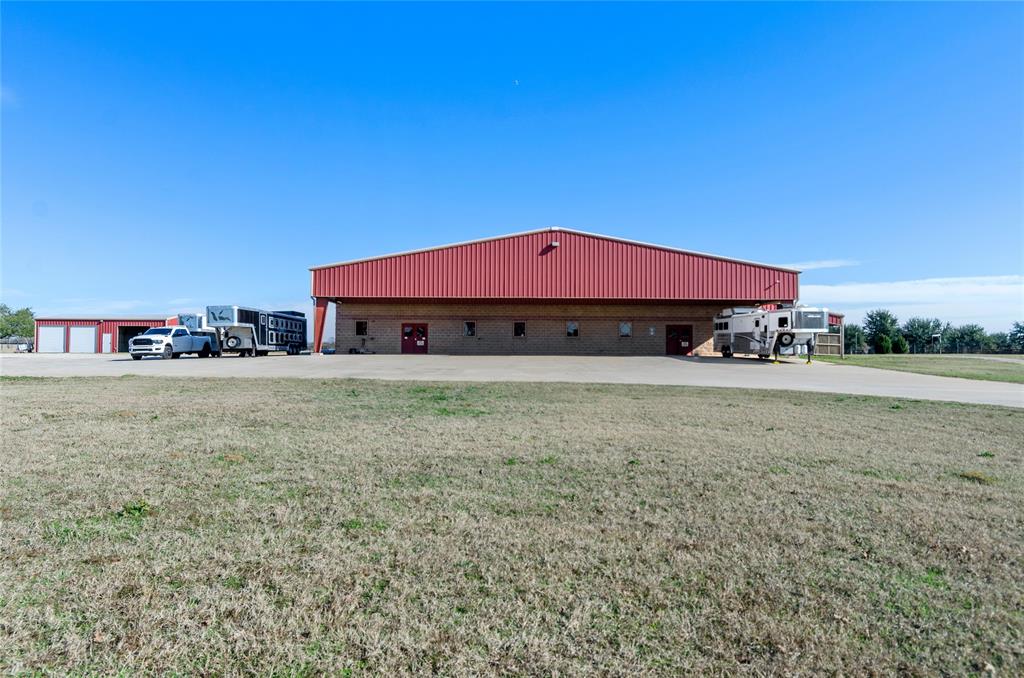 395 Yacht Club Road Oak Point, TX 75068 - Photo 13 of 23 View of building exterior with a detached garage