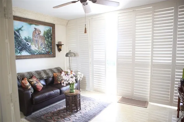 a bathroom with a toilet sink and shower