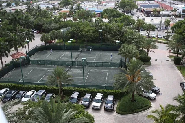 a plant that is in front of a bathroom