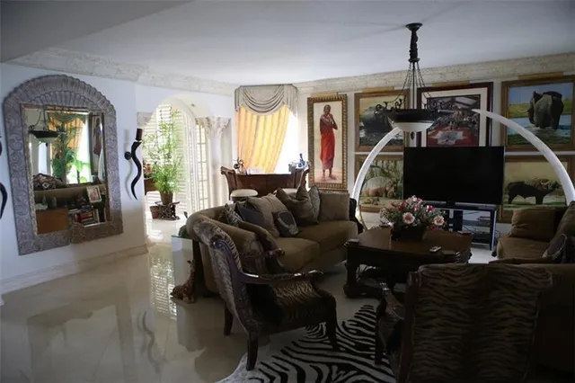 a view of a dining room with furniture window and outside view