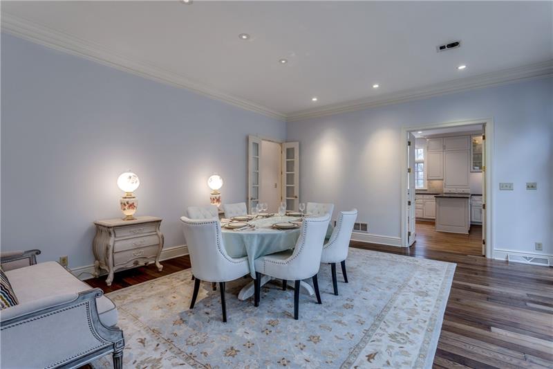 125 Witherow Road Sewickley, PA 15143 - Photo 15 of 25 Tis is a spacious Dining Room the floors are beautiful. The door in the rear opens to the kitchen.