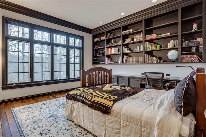 125 Witherow Road Sewickley, PA 15143 - Photo 17 of 25 This room has many options. The current Sellers used it as a bedroom for their son. It was designed as a den/office. but a closet could easily be constructed. The powder room is around the corner.