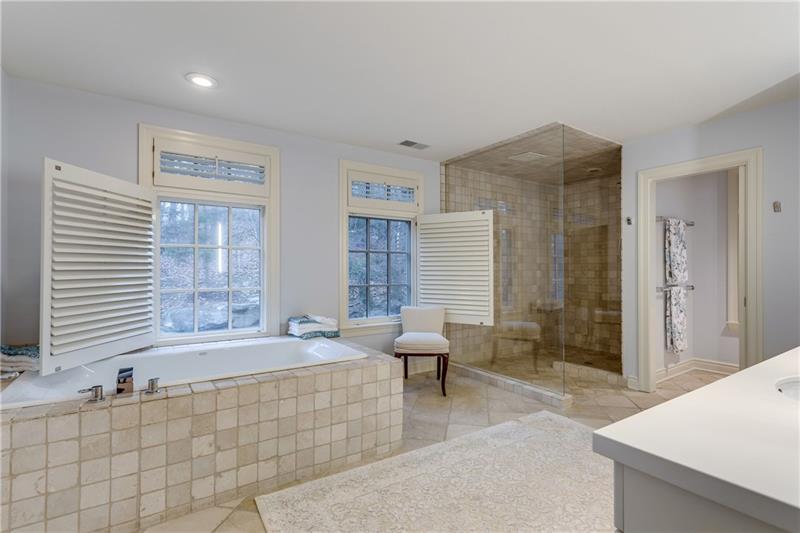 125 Witherow Road Sewickley, PA 15143 - Photo 20 of 25 Master Bath has double sinks, whirl pool tub large shower. Looks out to the woods.