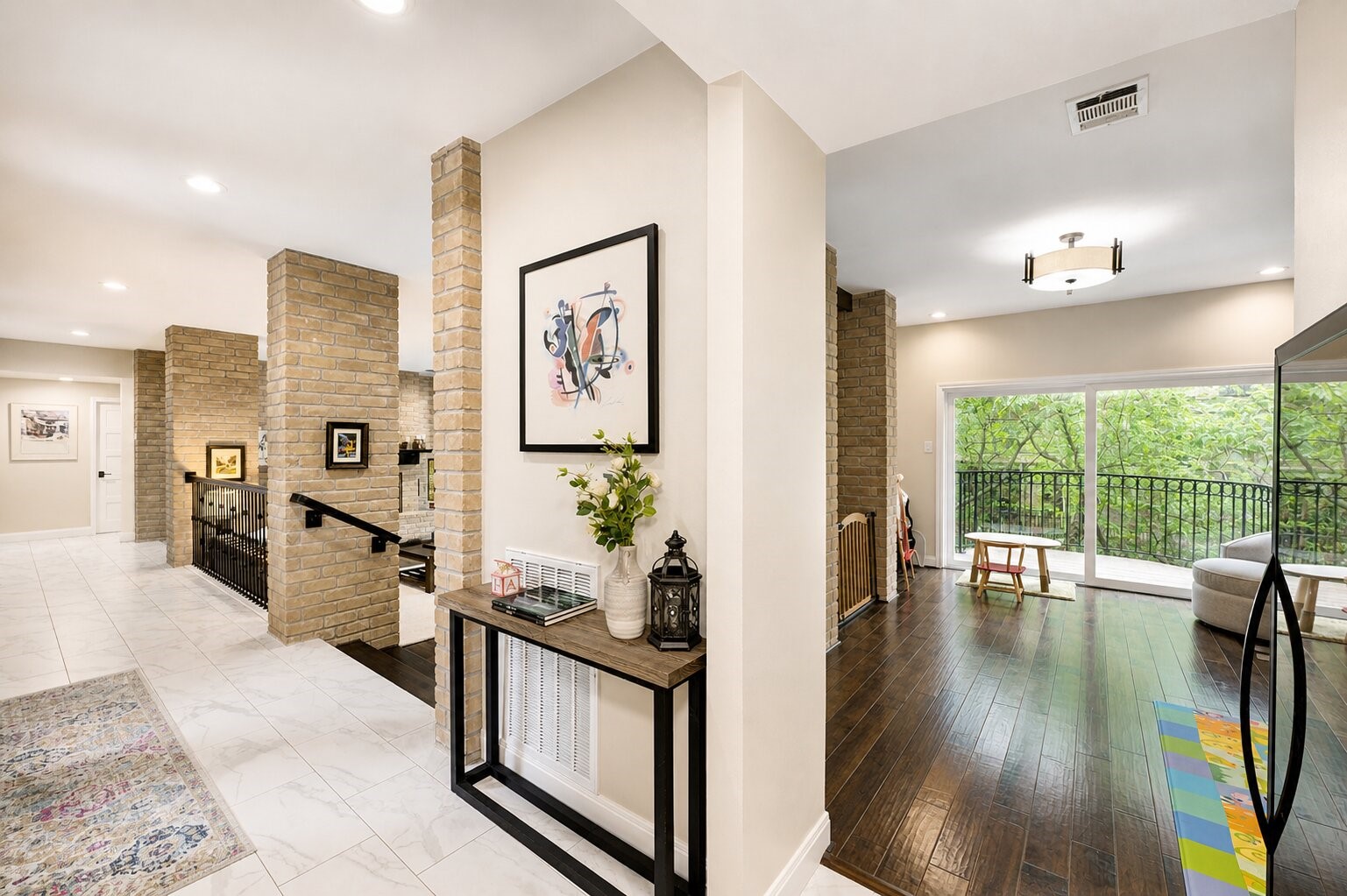 201 Vanderpool Lane, Unit 130 Houston, TX 77024 - Photo 6 of 41 The room to the right of the gallery can be used as a dining room, music room or secondary lounge. Another sliding glass door provides access to the rear balcony.