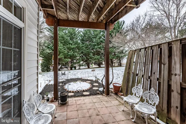 a view of a porch with furniture