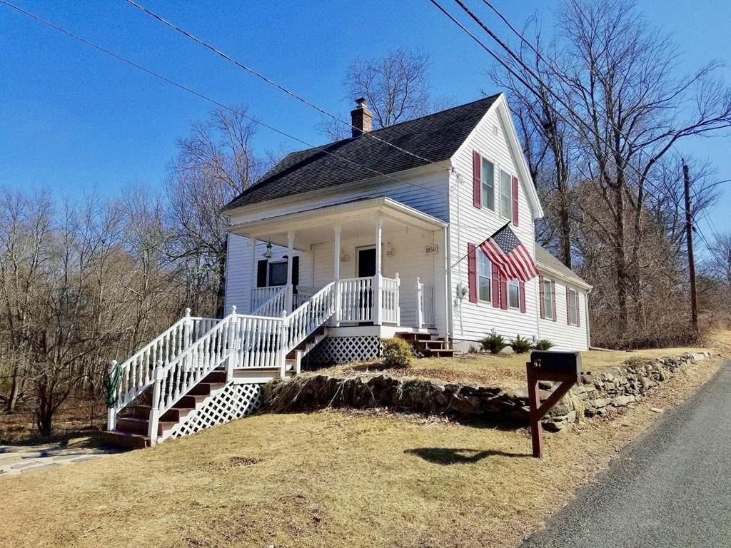 47 Chapin Road Hampden, MA 01036 - Photo 1 of 30 a front view of a house with a yard