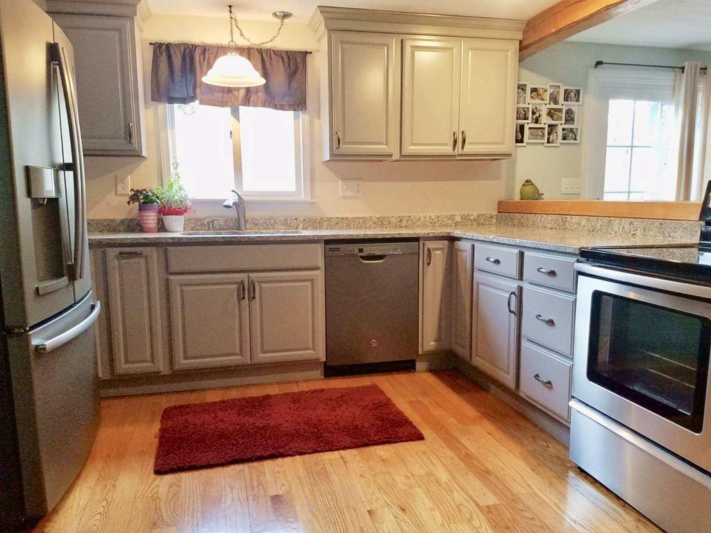 47 Chapin Road Hampden, MA 01036 - Photo 3 of 30 a spacious bathroom with a granite countertop sink and a mirror