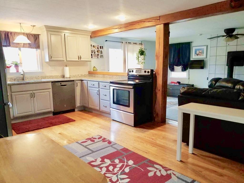 47 Chapin Road Hampden, MA 01036 - Photo 5 of 30 a kitchen with stainless steel appliances granite countertop a sink and cabinets