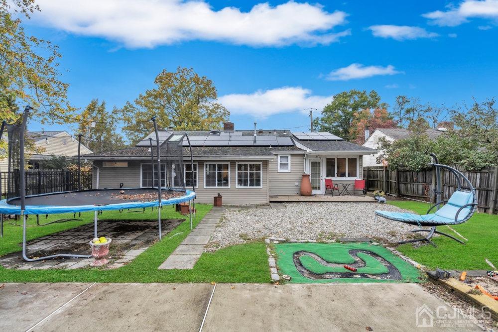 17 Whitney Drive Middlesex, NJ 08846 - Photo 15 of 18 a front view of house with yard and outdoor seating