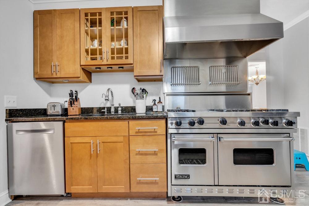17 Whitney Drive Middlesex, NJ 08846 - Photo 4 of 18 a kitchen with stainless steel appliances granite countertop a stove and a microwave