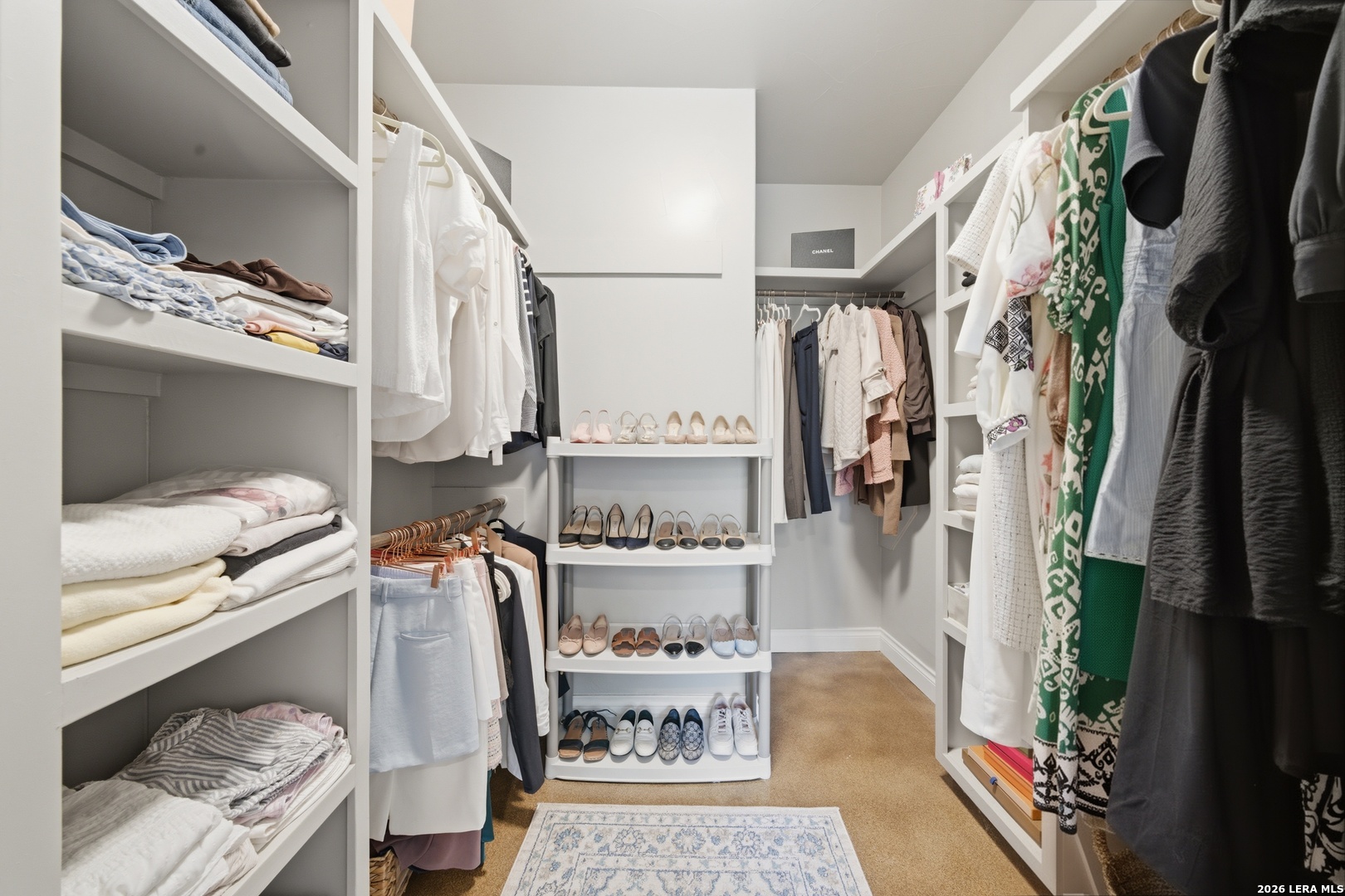 10042 Rafter S Trail Helotes, TX 78023 - Photo 29 of 69 a view of walk in closet with clothes and shoes
