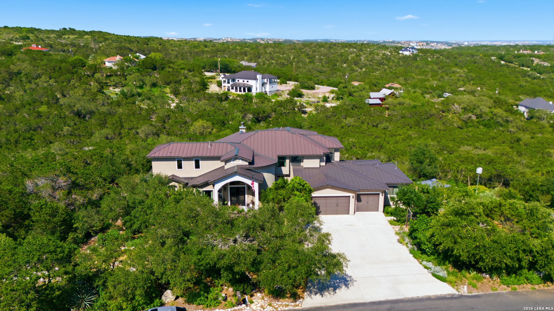 10042 Rafter S Trail Helotes, TX 78023 - Photo 3 of 69 a view of a house with a yard