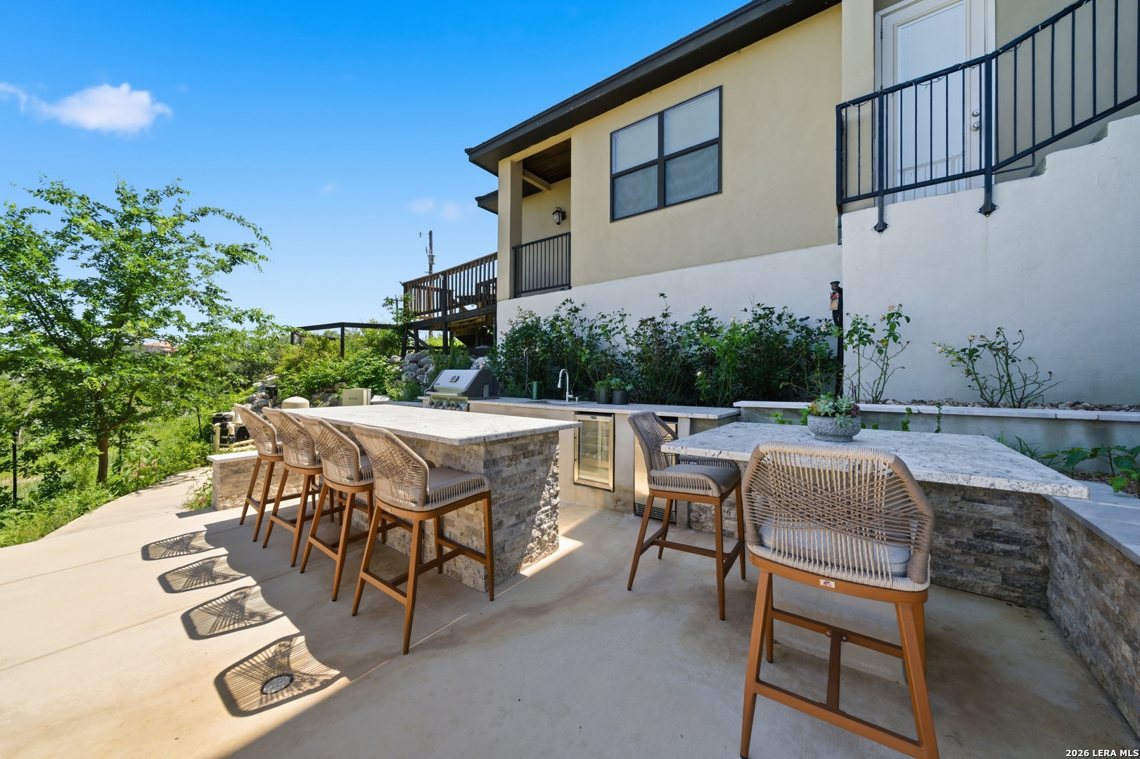 10042 Rafter S Trail Helotes, TX 78023 - Photo 45 of 69 a view of backyard of house with seating space