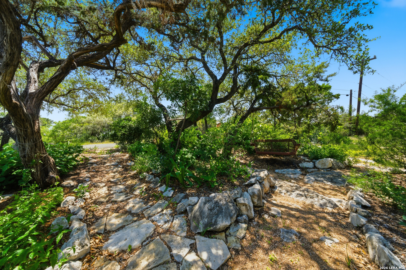 10042 Rafter S Trail Helotes, TX 78023 - Photo 55 of 69 a backyard of a house with lots of green space