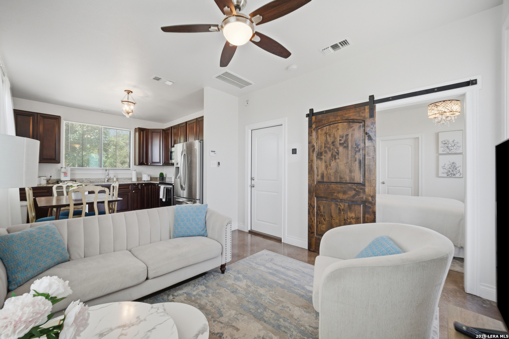 10042 Rafter S Trail Helotes, TX 78023 - Photo 60 of 69 a living room with furniture and a large window
