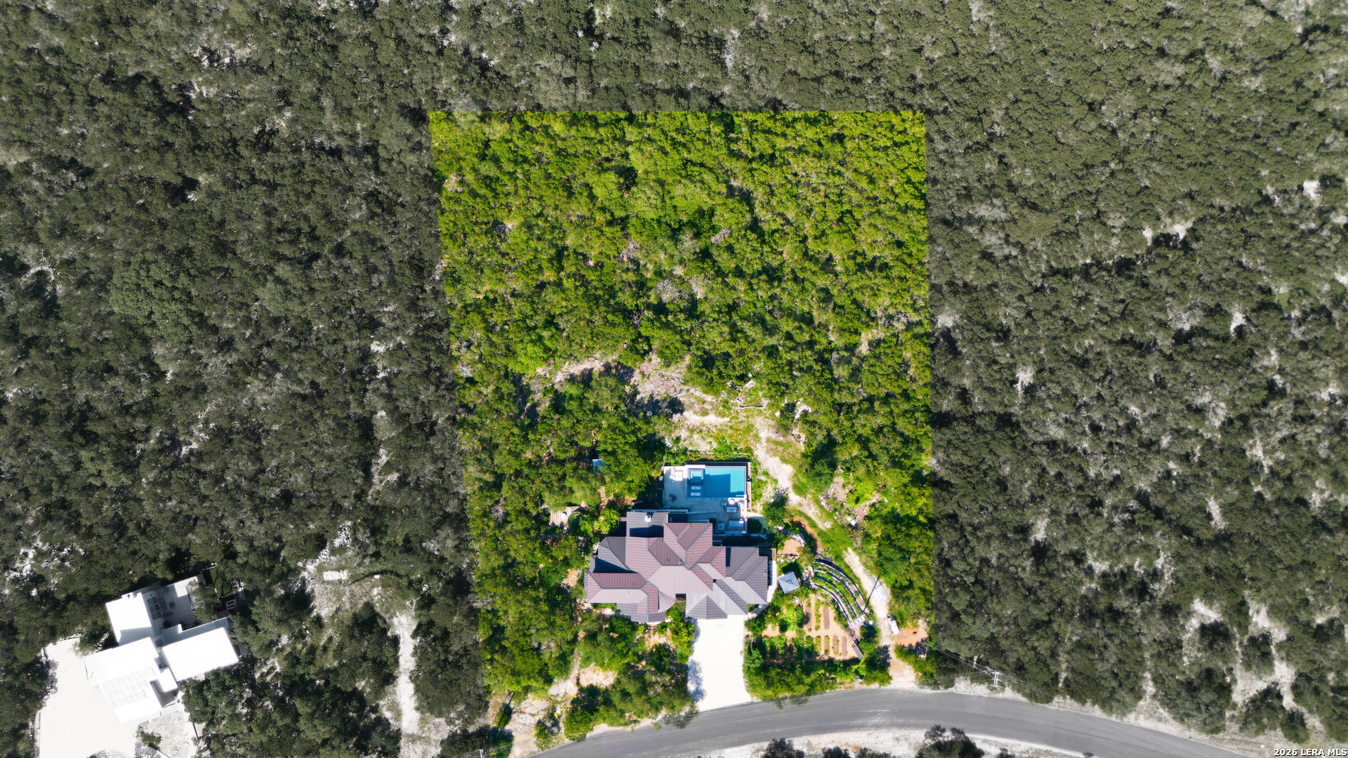 10042 Rafter S Trail Helotes, TX 78023 - Photo 68 of 69 a view of a city with lush green forest