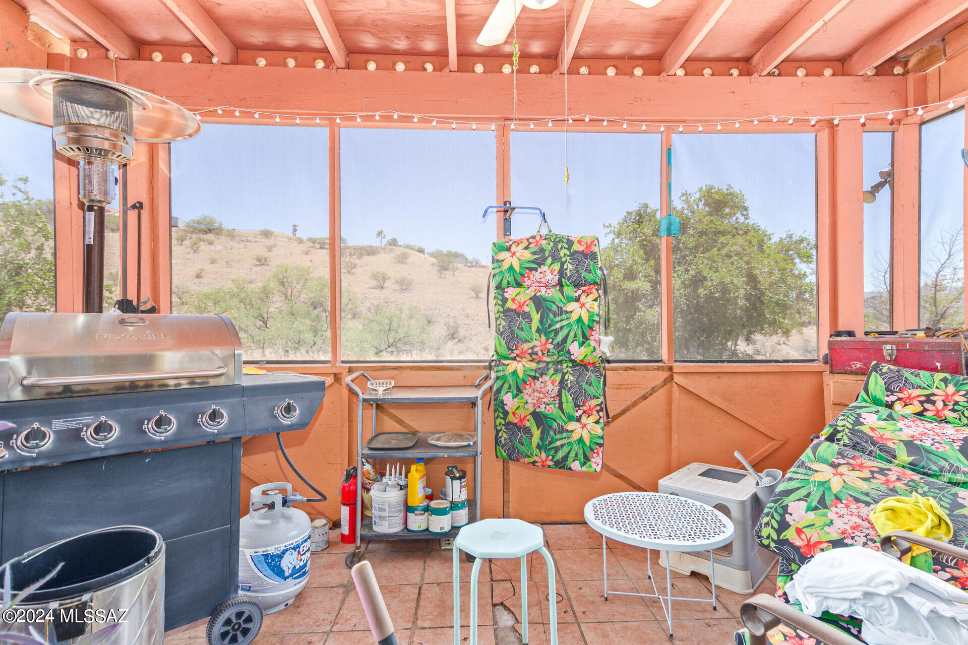 1232 Circulo Aguilar Rio Rico, AZ 85648 - Photo 25 of 32 a view of an chairs and table in the patio