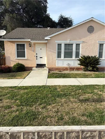 a view of a house with a patio