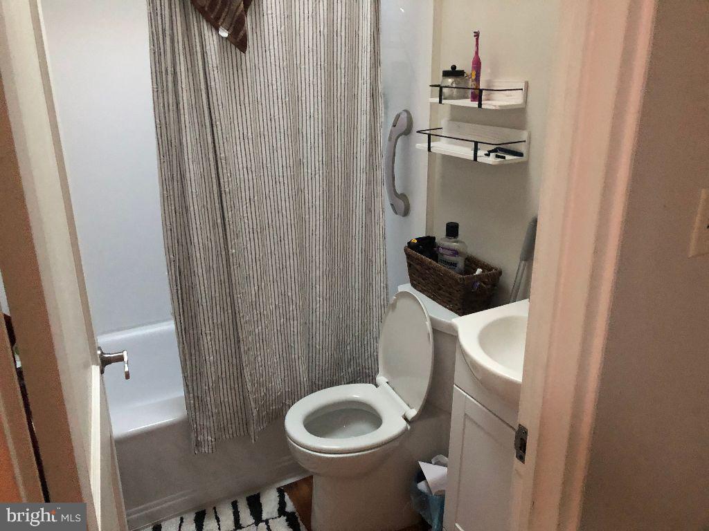 111 2nd Street Reading, PA 19607 - Photo 5 of 7 a bathroom with a toilet and a sink