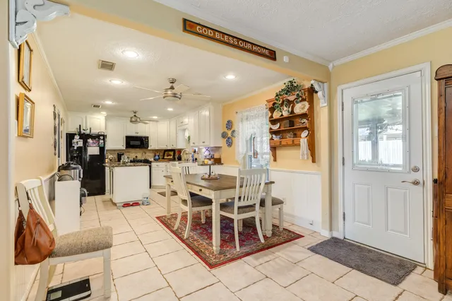 a view of a dining room with furniture