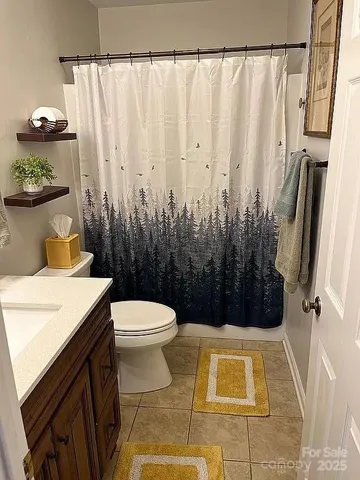 a bathroom with a sink and toilet