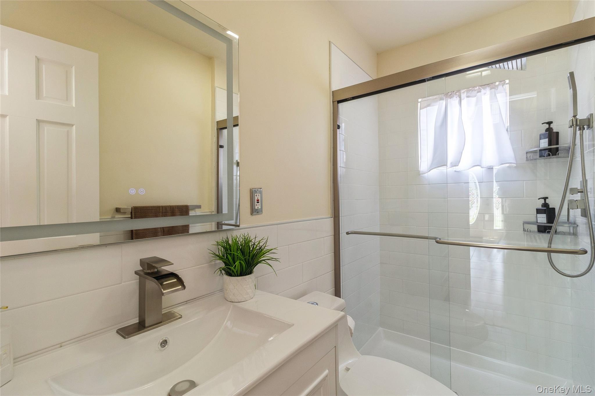 51 Oleeta Road Mount Sinai, NY 11766 - Photo 12 of 29 First Floor Bathroom