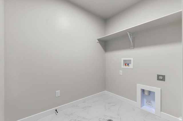 1567 North 3250 West Provo, UT 84601 - Photo 19 of 22 Laundry utility area featuring a wall-mounted shelf, water hookups, and a dedicated dryer vent