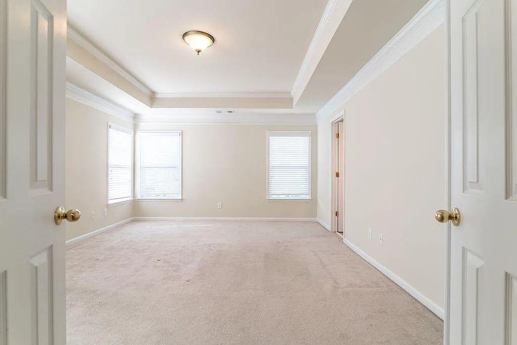 6120 Joybrook Road Duluth, GA 30097 - Photo 18 of 30 an empty room with windows