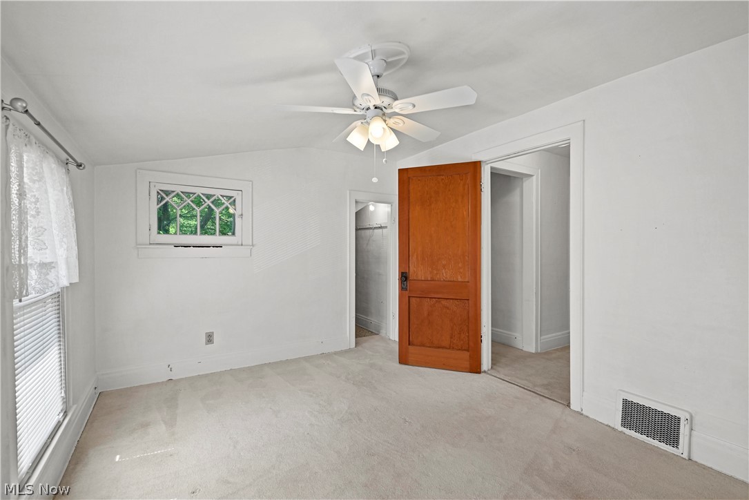 503 Ravenna Road Newton Falls, OH 44444 - Photo 14 of 34 Light-toned wall-to-wall carpeting complements the white painted walls and ceiling