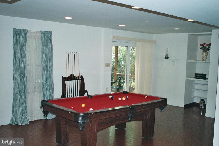 1813 Chapel Hill Road Silver Spring, MD 20906 - Photo 15 of 20 Recreation room with walkout to screened porch