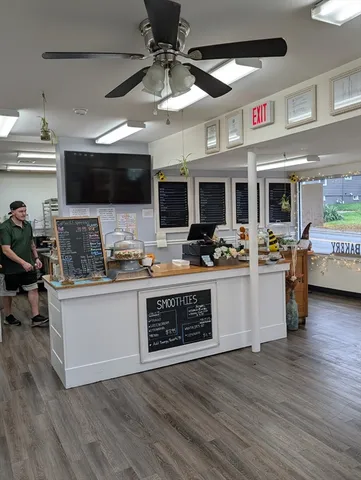 a kitchen with stainless steel appliances granite countertop a stove and a microwave