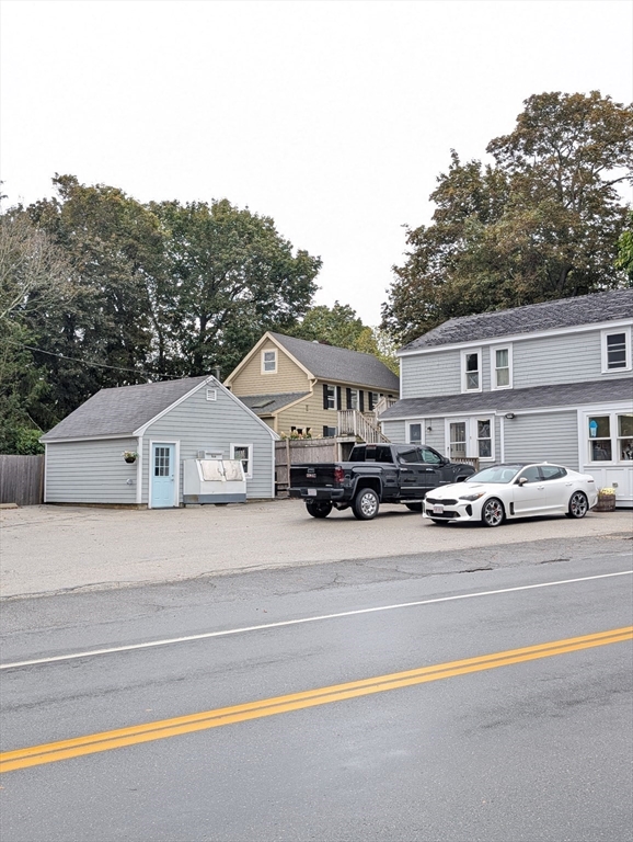 57 East Street Ipswich, MA 01938 - Photo 4 of 25 a view of multiple houses with a road