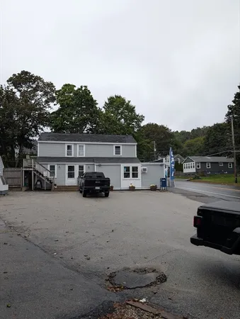 a car parked in front of a house