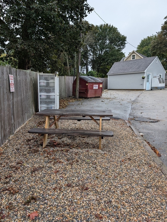 57 East Street Ipswich, MA 01938 - Photo 9 of 25 a front view of a house with a yard