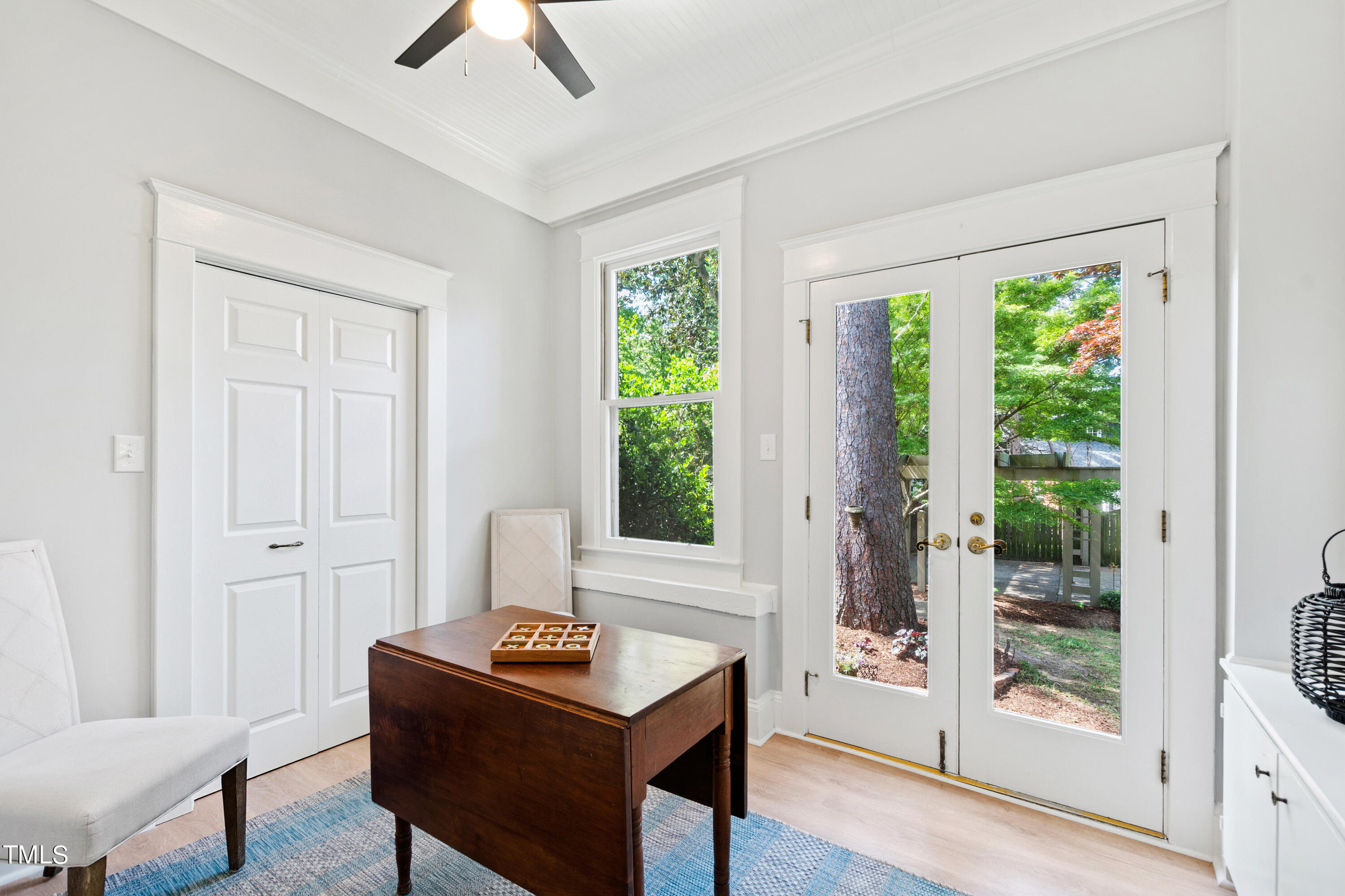 1803 Fairview Road Raleigh, NC 27608 - Photo 19 of 49 a view of a workspace with furniture and a window