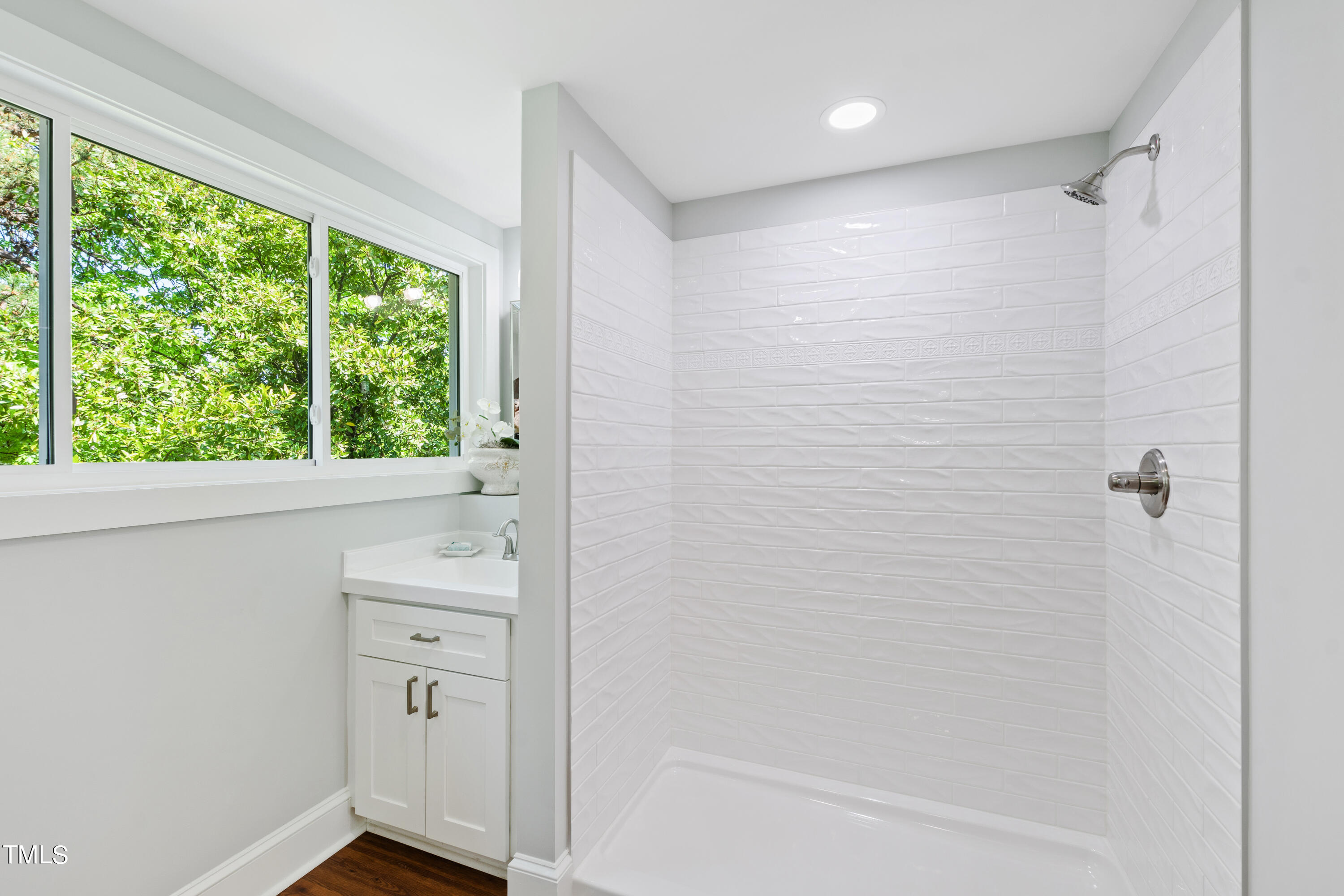 1803 Fairview Road Raleigh, NC 27608 - Photo 24 of 49 a bathroom with a bathtub and a shower
