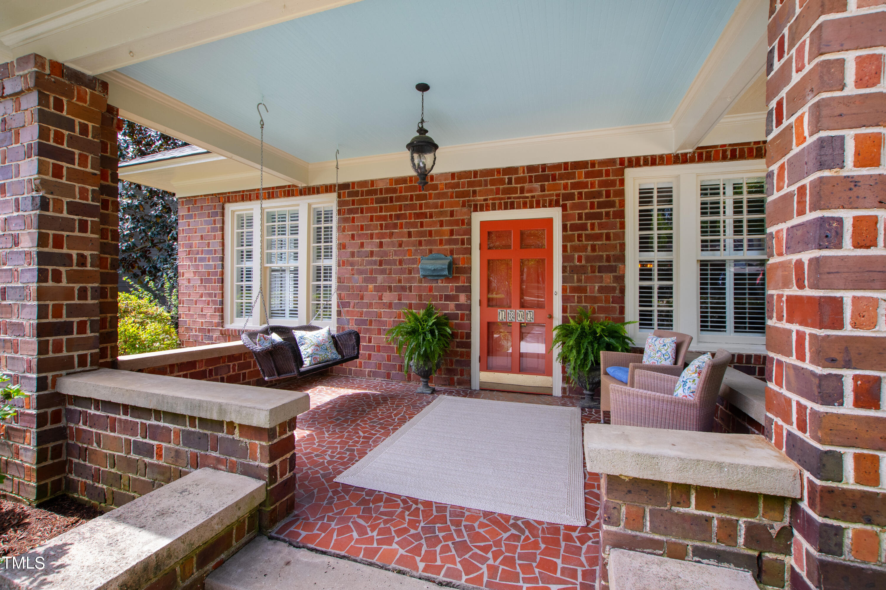 1803 Fairview Road Raleigh, NC 27608 - Photo 4 of 49 a backyard of a house with seating space