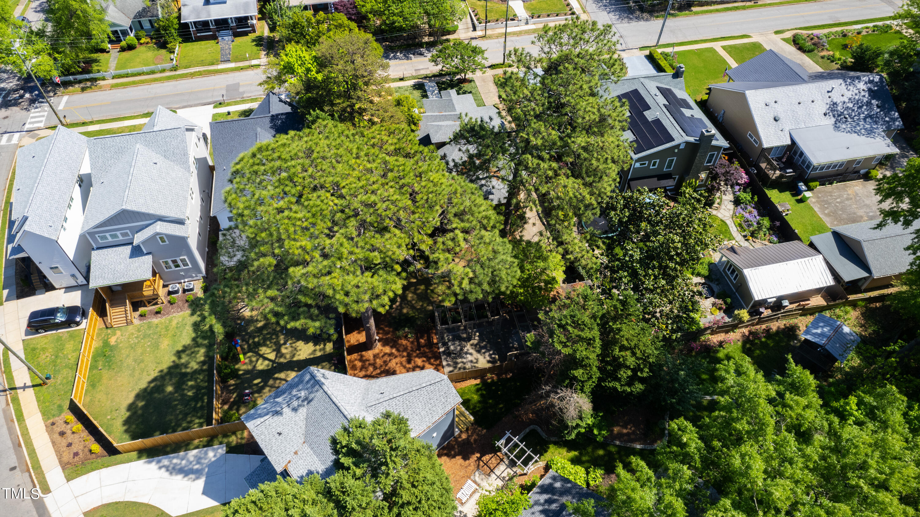 1803 Fairview Road Raleigh, NC 27608 - Photo 47 of 49 an aerial view of residential house with outdoor space and swimming pool